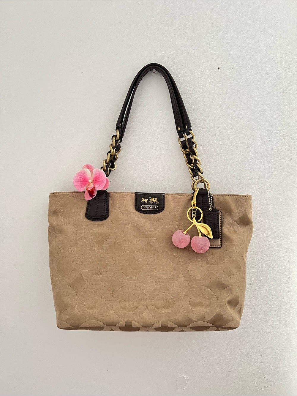 Coach Beige Signature Tote with Dark Brown Handles and Pink Cherry Charm